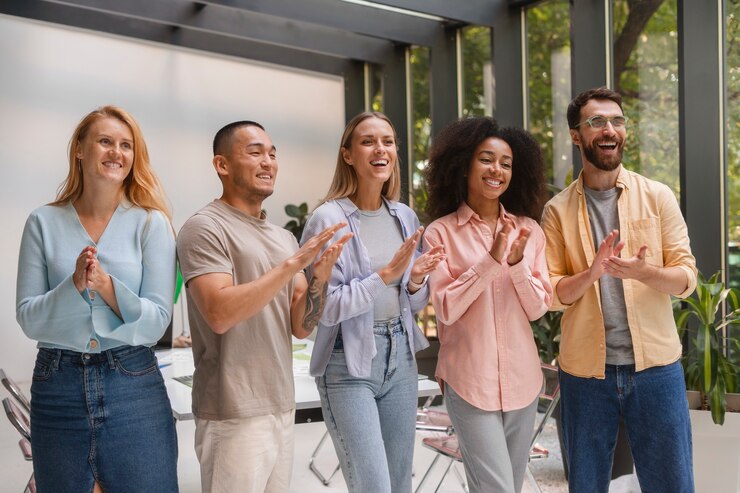 Free Photo people working in tech brand together