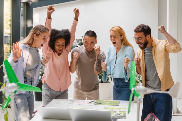 Free Photo people working in tech brand together