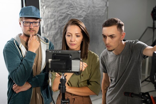 Free photo people working together for a new film