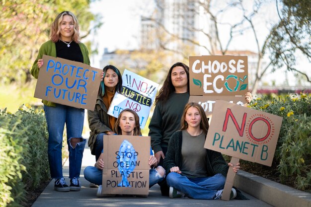 People at a world environment day protest with placards