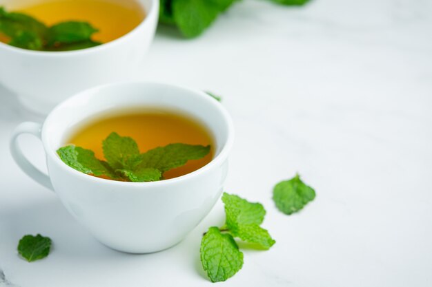 Peppermint tea in glass ready to drink