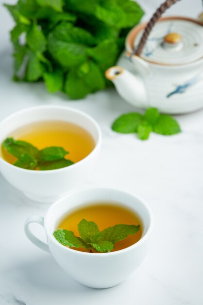 Peppermint tea in glass ready to drink