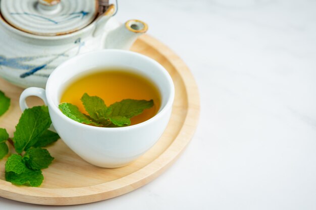 Peppermint tea in glass ready to drink