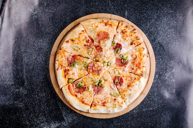 Pepperoni pizza cut into slices.