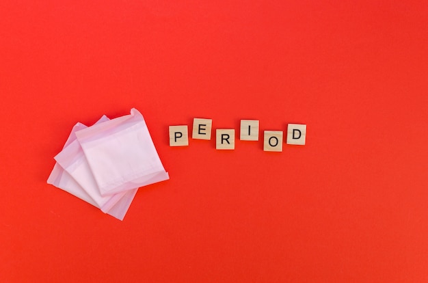 Free photo period word and scrabble letters with wrapped pads