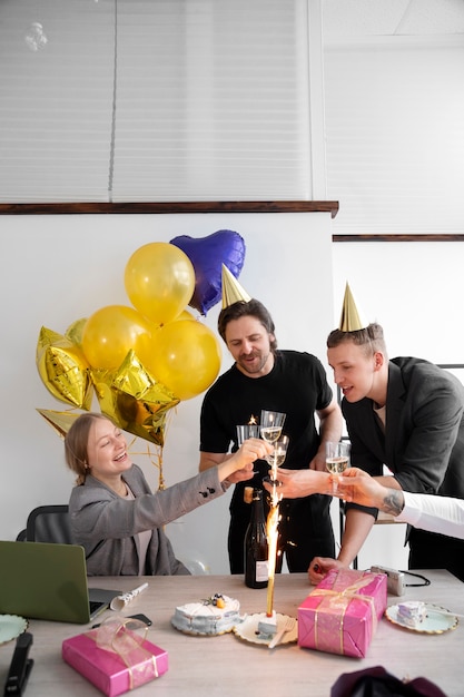 Person celebrating birthday at office