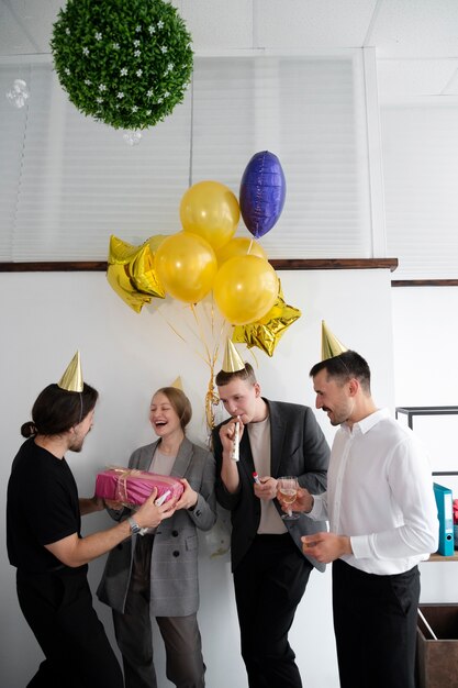 Person celebrating birthday at office