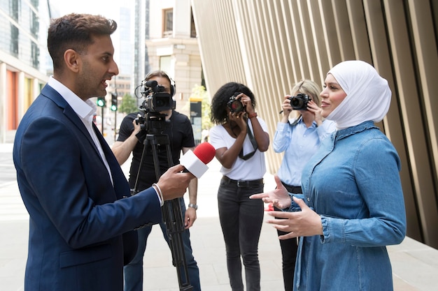 Free photo person conducting an interview