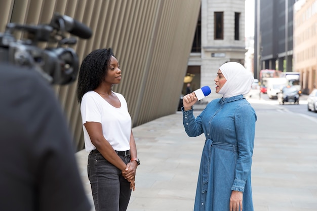 Free photo person conducting an interview