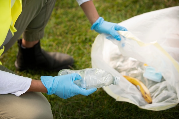 Person doing community service by collecting trash