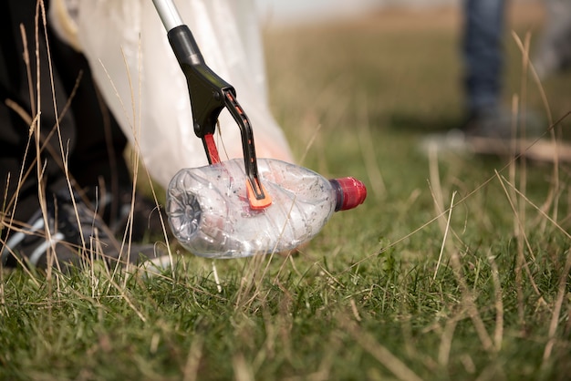 Person doing community service by collecting trash