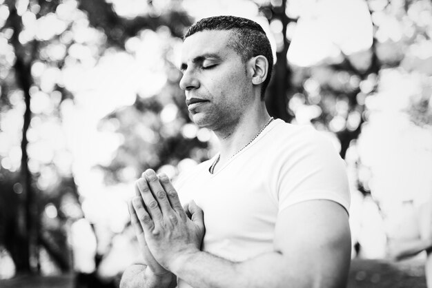 Person doing yoga at the park