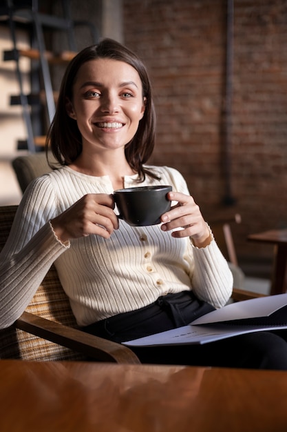 Person drinking beverage while in break time