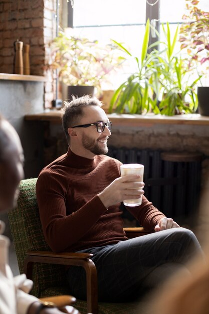 Person drinking beverage while in break time