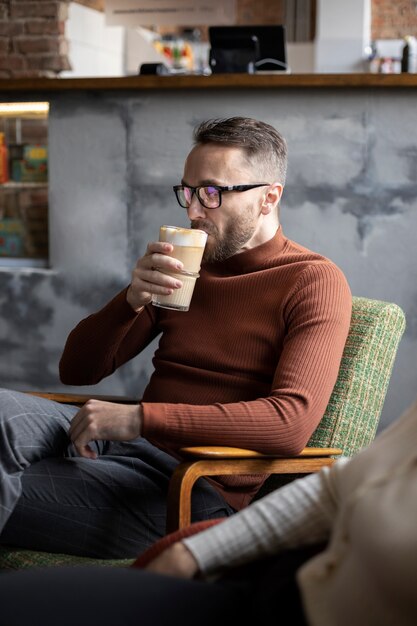 Person drinking beverage while in break time