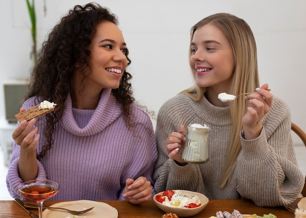 Person eating fresh cheese