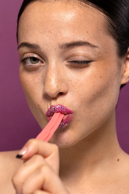 Person Eating A Sweet Candy Desert