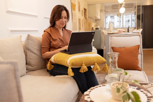 Free photo person enjoying relaxing time at home