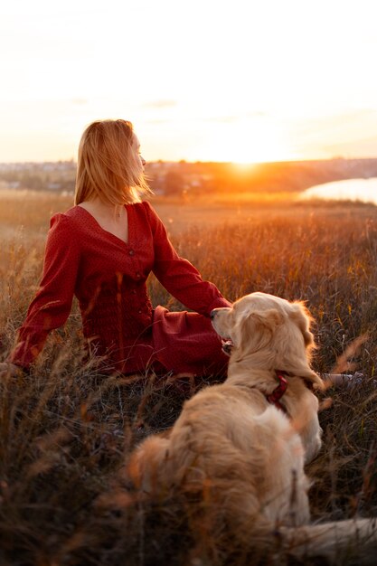 Person enjoying warm and nostalgic sunset