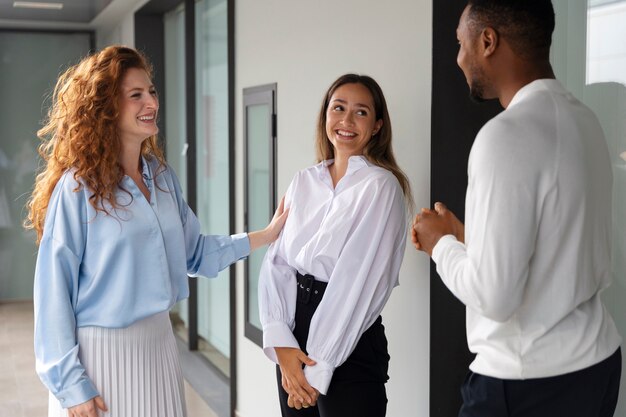 Person expressing appreciation to their workmates