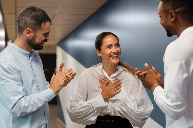 Person expressing appreciation to their workmates