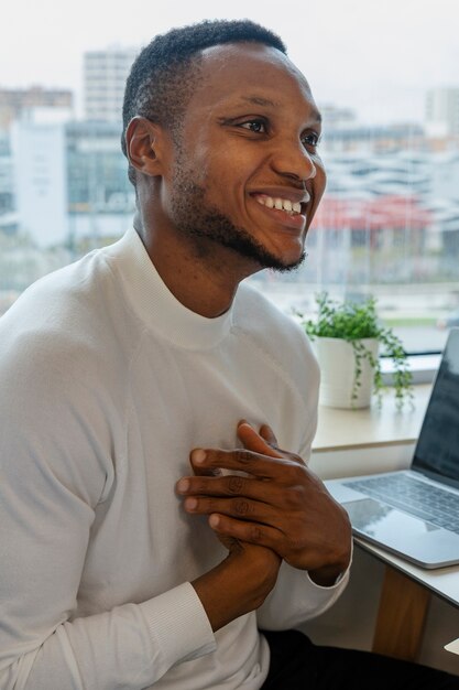 Person expressing appreciation to their workmates