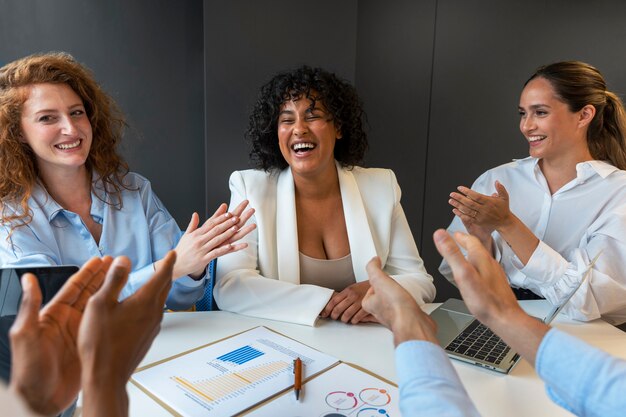 Person expressing appreciation to their workmates