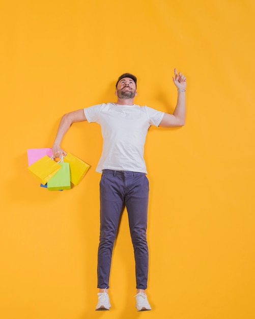 Person flying with shopping bags