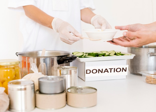 Person getting food as donation