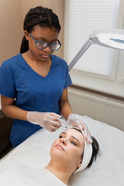 Person getting micro needling beauty treatment