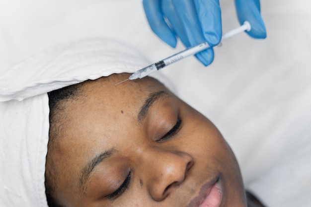 Person getting micro needling beauty treatment