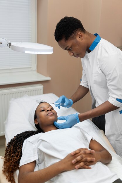Person getting micro needling beauty treatment