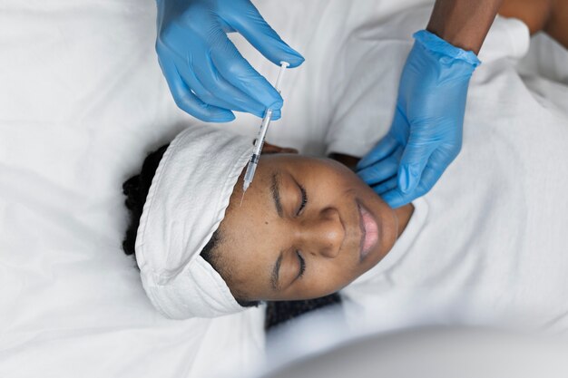 Person getting micro needling beauty treatment