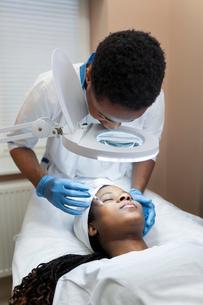 Person getting micro needling beauty treatment