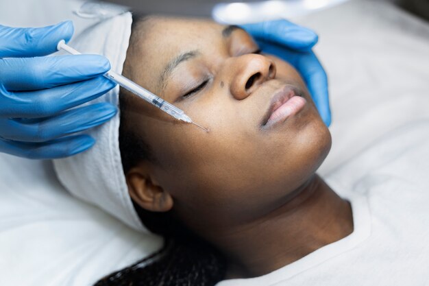 Person getting micro needling beauty treatment