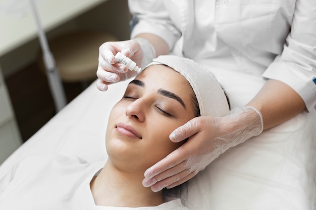 Person getting micro needling beauty treatment