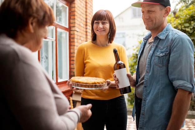 Free photo person helping their elder neighbour