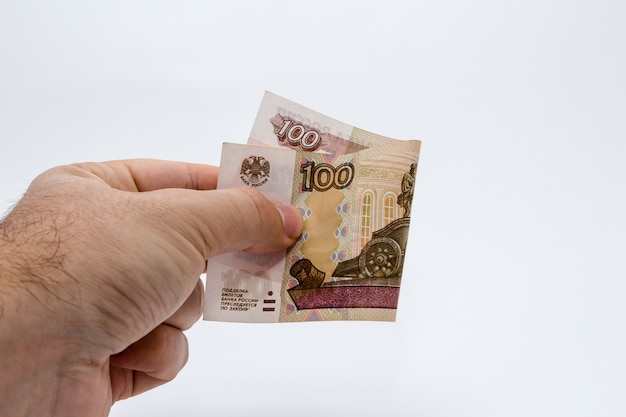 Бесплатное фото Лицо, держащее банкноту