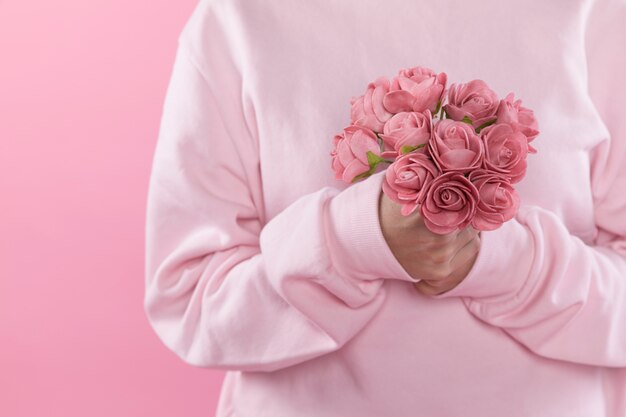 Person holding bouquet of flowers 