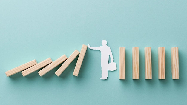 Free photo person holding a fallen wooden piece