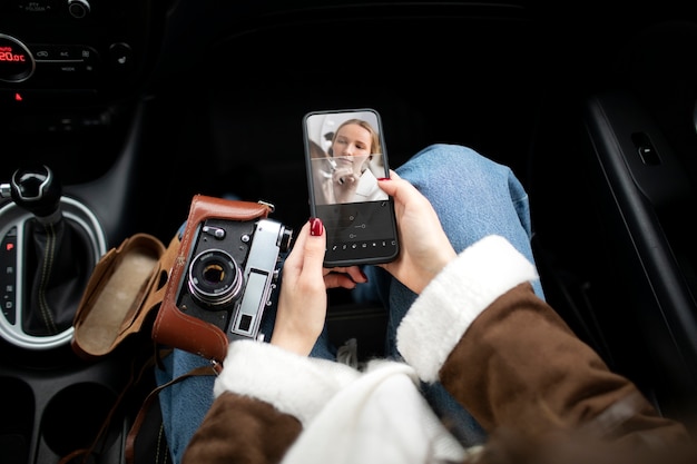 Person holding smartphone with social media app