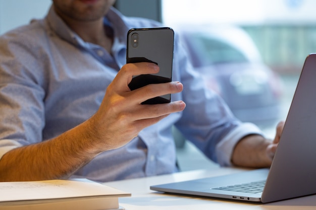 A person holding smartphone