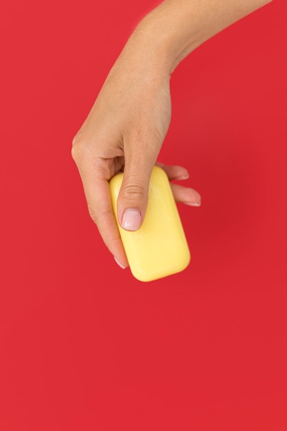 Person holding a soap