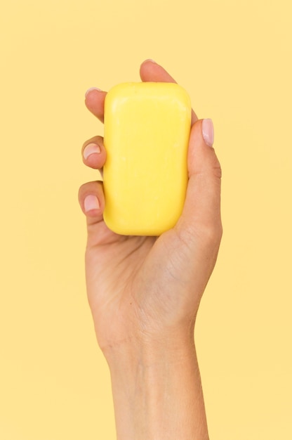 Person holding a soap