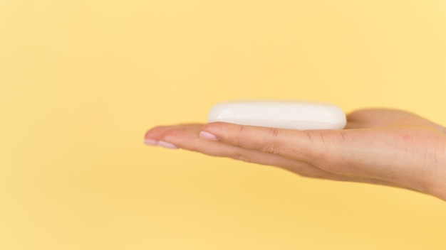 Person holding a soap