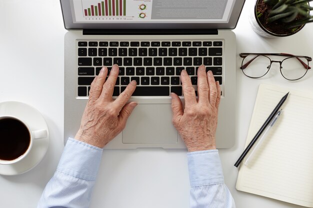 A person is using laptop for work