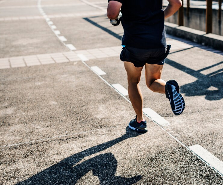 Free Photo person jogging at park
