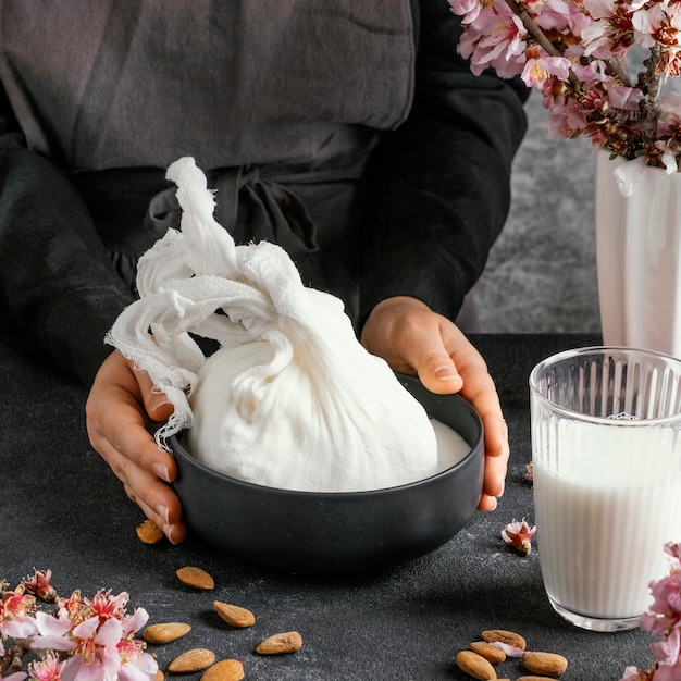 Person making almond milk