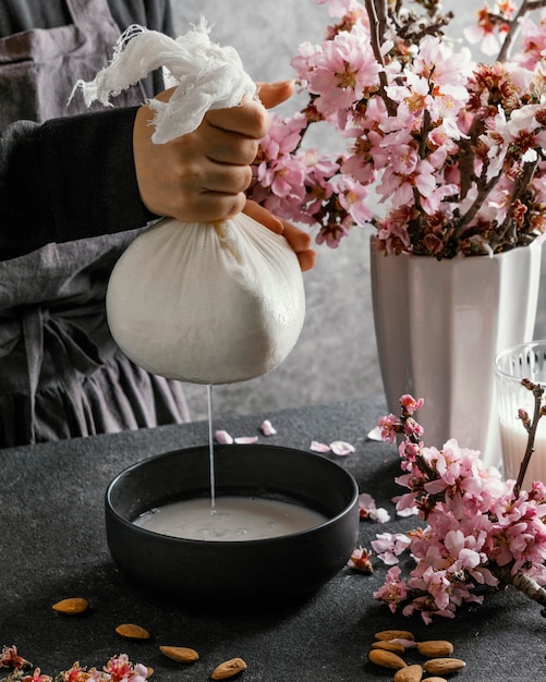 Person making almond milk