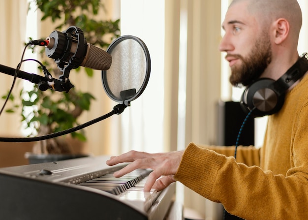 Person making music indoors